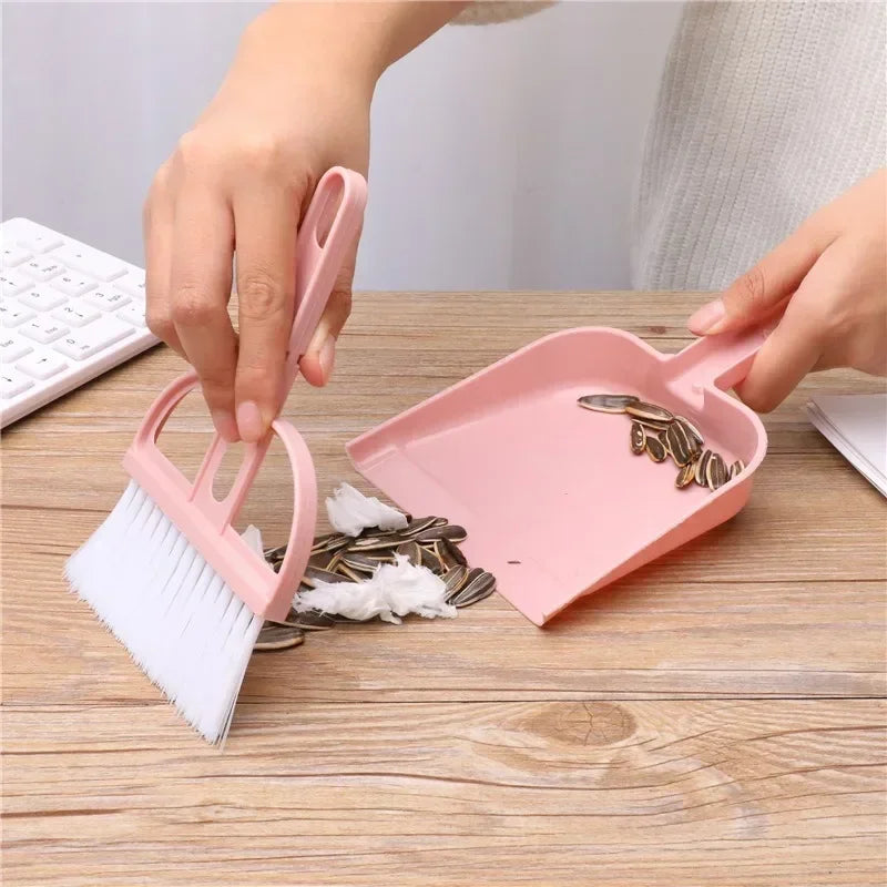 Mini dustpan and brush, for sawdust and food spillage.