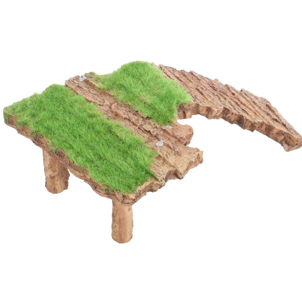 Resin reptile ornament basking area.